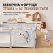 Детский манеж Lumpurini Tibaldo M серый с пластиковой дверцей, карманом для игрушек и противоскользящими присосками.